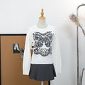Butterfly embroidery long sleeved round neck pullover sweater