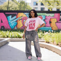 Street Style Irregular Ripped Denim Pants with False Two-Piece Design